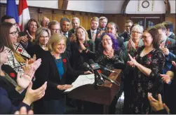  ?? Canadian Press photo ?? Alberta Premier Rachel Notley speaks to the government caucus before the fall sitting of the Alberta legislatur­e in Edmonton on Monday.