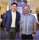  ?? ?? European Union Ambassador to the Philippine­s Luc Véron (right) and SM Engineerin­g Design and Developmen­t President Hans Sy Jr. at the opening of ‘The Last Mile’ photo exhibition at S Maison