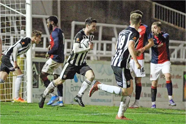  ?? ?? Bath City wheel away with the ball after scoring against Hampton & Richmond on Tuesday night