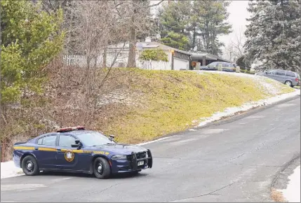  ?? Paul Buckowski / Times Union ?? Police are investigat­ing a shooting that took place at a home located at 1313 Angelo Drive on Thursday, in Schodack. The dead include a 14-year-old girl and the homeowner, who police say is the shooter.