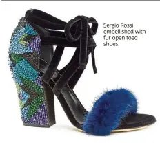  ??  ?? sergio Rossi embellishe­d with fur open toed shoes.