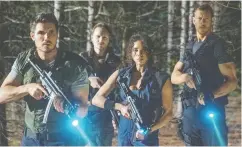  ?? ELEVATION PICTURES ?? Robbie Amell, Chad Rook, Hannah John-kamen and Tom Hopper take on pharma-induced zombies
in the latest Resident Evil sequel.