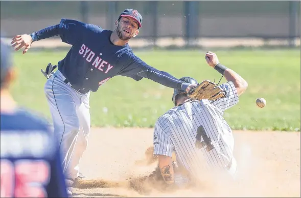  ?? RYAN TAPLIN/SALTWIRE NETWORK ?? The throw from the catcher sails past Sydney Sooners shortstop Chris Farrow as Dartmouth Moosehead Dry centre fielder Chris Head of River Ryan steals second base during Game 2 of the Nova Scotia Senior Baseball League final at Dartmouth’s Beazley Field on Sunday afternoon.