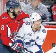  ?? AP PHOTO ?? Washington Capitals forward Alex Ovechkin, left, collides with Tampa Bay Lightning defenceman Anton Stralman during the third period of Game 6 of the NHL Eastern Conference finals playoff series Monday in Washington.