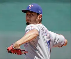  ?? Associated Press ?? n Texas Rangers starting pitcher Yu Darvish throws during the second inning of a baseball game against the Kansas City Royals on Sunday in Kansas City, Mo.