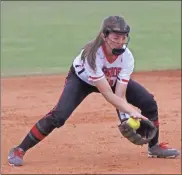  ?? Scott Herpst ?? LFO third baseman Julie Shore scoops up a grounder during last week’s home game against Adairsvill­e. The Lady Warriors scored four times in the sixth inning to win 4-0.