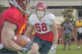  ?? John McGillen USC Athletics ?? USC LINEBACKER Solomon Tuliaupupu, who has endured two years of surgeries and rehabilita­tion because of a left foot injury, hopes to stay healthy in 2020.