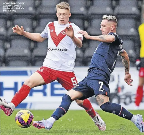  ?? ?? GoING ToE-To-ToE Callumn Morrison tussles with Airdrie’s Ben Stanway