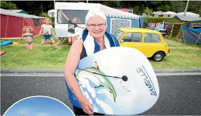  ?? CHARLOTTE CURD/ STUFF ?? Chris Withers has been camping at Oakura Beach every summer since 1973. This summer, she will be joined by her grandchild­ren – from left, Danielle, Hayley and Lauren Tewhata – who were born in France.