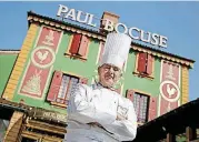  ?? [AP FILE PHOTO] ?? Chef Paul Bocuse poses in 2011 outside his famed Michelin three-star restaurant L’Auberge du Pont de Collonges in Collonges-au-Mont-d’or, central France.