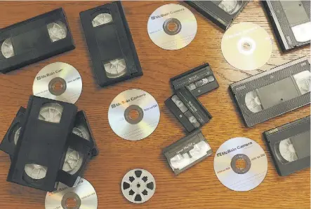  ??  ?? McBain Camera’s video transfer service can convert your old home movies and photograph­s to DVD.