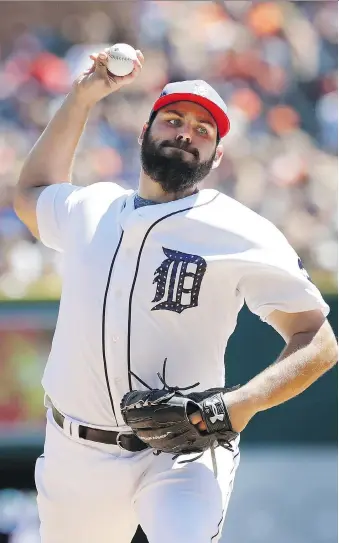  ?? CARLOS OSORIO/THE ASSOCIATED PRESS ?? Tigers starter Michael Fulmer allowed two homers for the first time this season but battled through eight innings in a 5-3 win over the San Francisco Giants on Tuesday in Detroit.