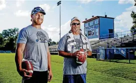 ?? [PHOTO BY BRYAN TERRY, THE OKLAHOMAN] ?? Chandler football coach Jack Gray, left, and assistant coach Neal Bacon are trying to revive the past glory of the Lions. Gray was the quarterbac­k and Bacon the head coach when Chandler played in the 2008 Class 2A state championsh­ip game against Heritage Hall.