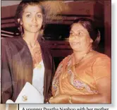  ??  ?? A younger Preetha Nanhoo with her mother, Sonpati, when she graduated as a teacher