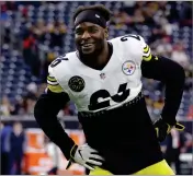  ?? MICHAEL WYKE ?? In this Dec. 25, 2017, file photo, Pittsburgh Steelers running back Le’veon Bell warms up before an NFL football game against the Houston Texans, in Houston.