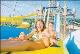  ?? HANDOUT VIA THE NEW YORK TIMES ?? Guests enjoy the Master Blaster water coaster at Schlitterb­ahn in New Braunfels, Texas. The ride begins atop a 65-foot-tall platform.