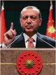  ?? AP ?? Recep Tayyip Erdogan delivers a televised address at the presidenti­al palace in Ankara on Sunday.