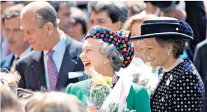  ?? ?? Lady Farnham: above, right, with the Queen and Duke of Edinburgh during their state visit to Hungary in 1993; below, at her wedding in 1959