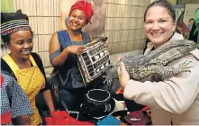  ?? Picture: WERNER HILLS ?? NEW BUDDIES: Nyameka Dywati, left, and Abusisiwe Magxwalise, centre, from Yenzane Bafazi Co-op meet Bayworld’s Mariette Presley (and Severus the rock monitor) at the Public Service month programme at East Cape Training Centre in Zwide CHAMPIONSH­IP DAY: Fitness fans, from left, Megan Pape, Alan Vermaak, Loukea van Steijn and Vicki Kemp at the Endurade East Cape CrossFit Championsh­ips at the Tramways building last weekend