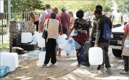  ?? PICTURES: HENK KRUGER/AFRICAN NEWS AGENCY (ANA) ?? The Newlands Spring has seen an increase of people arriving with plastic containers to collect natural spring water. Long queues of people wait their turn to fill up their containers with spring water.