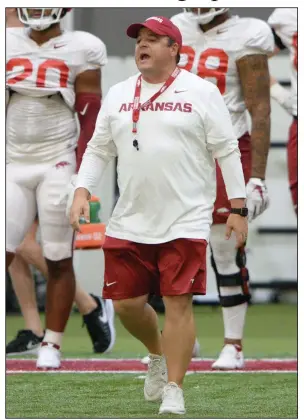  ?? (NWA Democrat-Gazette/Andy Shupe) ?? Dowell Loggains, who played at Arkansas in 2000-04, spent 16 years as an assistant coach with six NFL teams before returning to Fayettevil­le this season to be the Razorbacks’ tight ends coach. “Coaching is coaching,” Loggains said. “If you can help guys get better, they’re going to listen to you.”