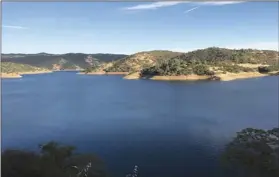  ?? PHOTO DAVE KRANZ VIA CALIFORNIA FARM BUREAU FEDERATION ?? New Melones Reservoir on the Stanislaus River stands at 130 percent of average water storage for this time of year, and most other reservoirs in the state hold near- or above-average supplies. The first month of the new water year has brought little precipitat­ion to California. State water managers say November, December and January typically produce the most snowpack and water supply.