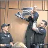  ?? JACQUELYN MARTIN — ASSOCIATED PRESS ?? A protester is lifted off of a chair by U.S. Capitol Police while standing on it and shouting during testimony by Supreme Court nominee Brett Kavanaugh on the third day of his confirmati­on hearing.