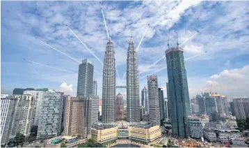  ??  ?? Based on the current indicators, analysts are optimistic that Malaysia’s economy to expand by 4.9 per cent this year given the upbeat performanc­e of domestic and global economy. — Bernama photo