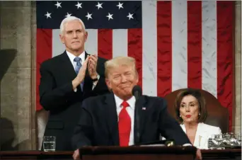  ?? LEAH MILLIS — POOL VIA AP ?? President Donald Trump delivers his State of the Union address to a joint session of Congress in the House Chamber on Capitol Hill in Washington, Tuesday as Vice President Mike Pence and Speaker Nancy Pelosi look on.