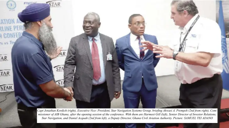  ?? Picture: SAMUEL TEI ADANO ?? Capt Jonathan Kordich (right), Executive Vice- President, Star Navigation Systems Group, briefing Akwasi A. Prempeh (2nd from right), Commission­er of AIB Ghana, after the opening session of the conference. With them are Harmeet Gill (left), Senior Director of Investor Relations, Star Navigation, and Daniel Acquah (2nd from left), a Deputy Director, Ghana Civil Aviation Authority.