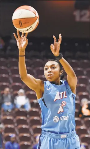  ?? Jessica Hill / Associated Press ?? The Atlanta Dream’s Renee Montgomery during the first half of a preseason WNBA game on May 14 in Uncasville. Montgomery recently took up acting classes in Atlanta at Nick Conti’s Profession­al Actors Studio.