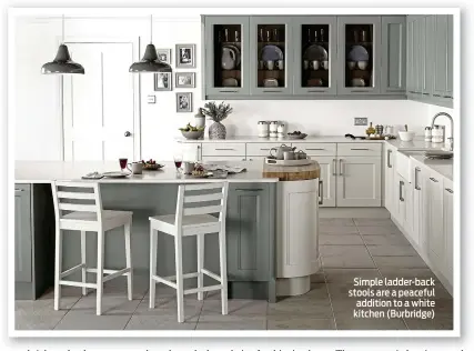  ??  ?? Simple ladder-back stools are a peaceful addition to a white kitchen (Burbridge)