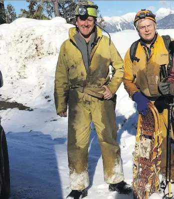  ?? COURTESY OF LEE HOLLIS ?? Caver Lee Hollis, left, and archaeolog­ical surveyor John Pollack are part of the first research team to explore an enormous cave discovered last March in Wells Gray Provincial Park.