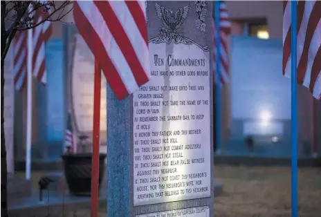  ?? PHOTO BY JON AUSTRIA/THE DAILY TIMES VIA AP ?? The Bloomfield Ten Commandmen­ts memorial is shown at city hall in Bloomfield, N.M.