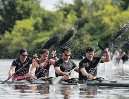  ?? JAMES PARK/OTTAWA CITIZEN ?? Adam van Koeverden (second from right) and his teammates Rob Clarke, Brady Reardon and Chris Mehak from Burloak Canoe Club finish in first place in the senior men’s K4 1,000 metres at Spirit Canoe and Kayak National Championsh­ip at Mooney’s Bay on...