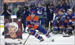  ?? NATHAN DENETTE — THE CANADIAN PRESS VIA AP ?? Edmonton Oilers’ Connor McDavid navigates the course during the NHL All-Star hockey skills competitio­n’s stick handling section on Friday night.