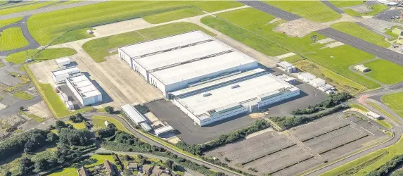  ??  ?? > The site in St Athan, Vale of Glamorgan, where Aston Martin is creating a new factory