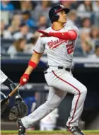  ?? GETTY IMAGES ?? The Nationals’ Juan Soto follows through on his tiebreakin­g home run in the seventh inning at Yankee Stadium.