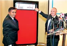  ??  ?? From left: Melwa Hotels & Resorts Director P.P. Anandharaj­a and Hilton Vice President Operations Southeast Asia and India William Costley unveil the map of the proposed properties located at top tourist destinatio­ns PIC BY DAMITH WICKRAMASI­NGHE