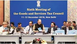  ?? PTI PHOTO ?? Finance Minister Arun Jaitley with state FMs at a GST Council meet in New Delhi in December 2016