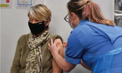  ?? Photograph: Jacob King/EPA ?? An NHS vaccine centre in Birmingham. The UK’s vaccinatio­n programme is forecast to be about a week and a half behind the US, but six weeks ahead of the EU.