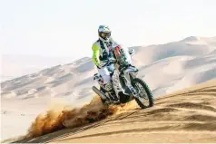  ?? ?? DESERT WARRIOR . . . Zimbabwe’s Ashley Thixton fires his bike through the dunes during Stage 7 of the 2024 Dakar Rally in Saudi Arabia on Sunday