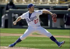  ?? Ap file ?? Los angeles dodgers pitcher trevor Bauer is the highest-paid player in 2021 at $38 million after agreeing to a $102 million, three-year contract he can terminate after one season.