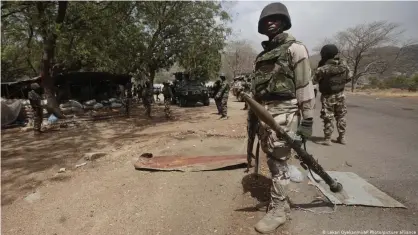  ??  ?? In this file photo, Nigerian soldiers man a checkpoint in Gwoza