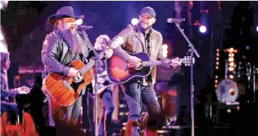  ?? — Courtesy of NBC ?? Head and Josh Gallagher perform on ‘The Voice’. (Below) Sundance Head, the Season 11 winner of ‘The Voice’.