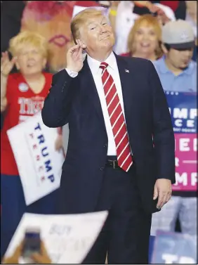  ?? AP PHOTO ?? President Donald Trump gestures at a rally at the Phoenix Convention Center.