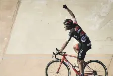  ??  ?? Van Avermaet punches the air after winning his irst monument at Roubaix in 2017