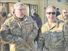  ?? Robert Burns The Associated Press ?? Chairman of the U.S. Joint Chiefs of Staff Gen. Mark Milley, left, talks Wednesday with Gen. Scott Miller, the commander of forces in Afghanista­n, in Kabul, Afghanista­n.