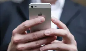  ??  ?? The joy of text … smartphone users are reaching speeds of 38 words per minute. Photograph: Yui Mok/PA