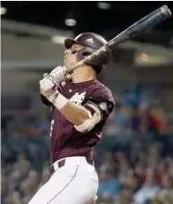  ?? (Photo by Rogelio V. Solis, AP) ?? Mississipp­i State's Brent Rooker watches a three-run home run leave his bat earlier this season.